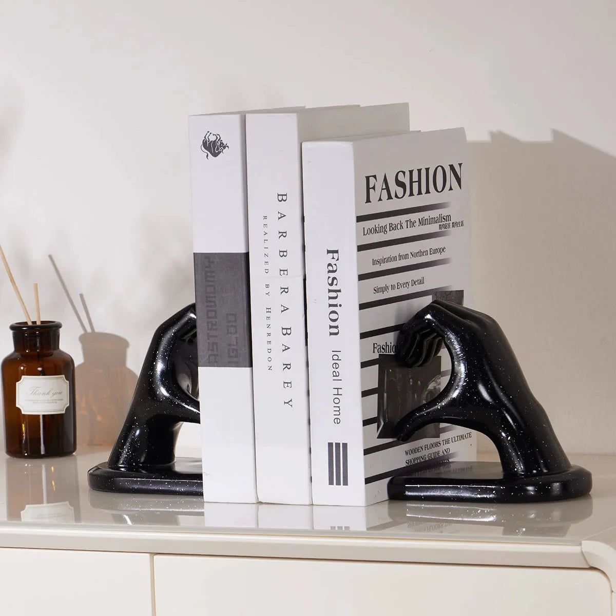 Golden Love Gesture Bookend — elegant resin décor for home or office.